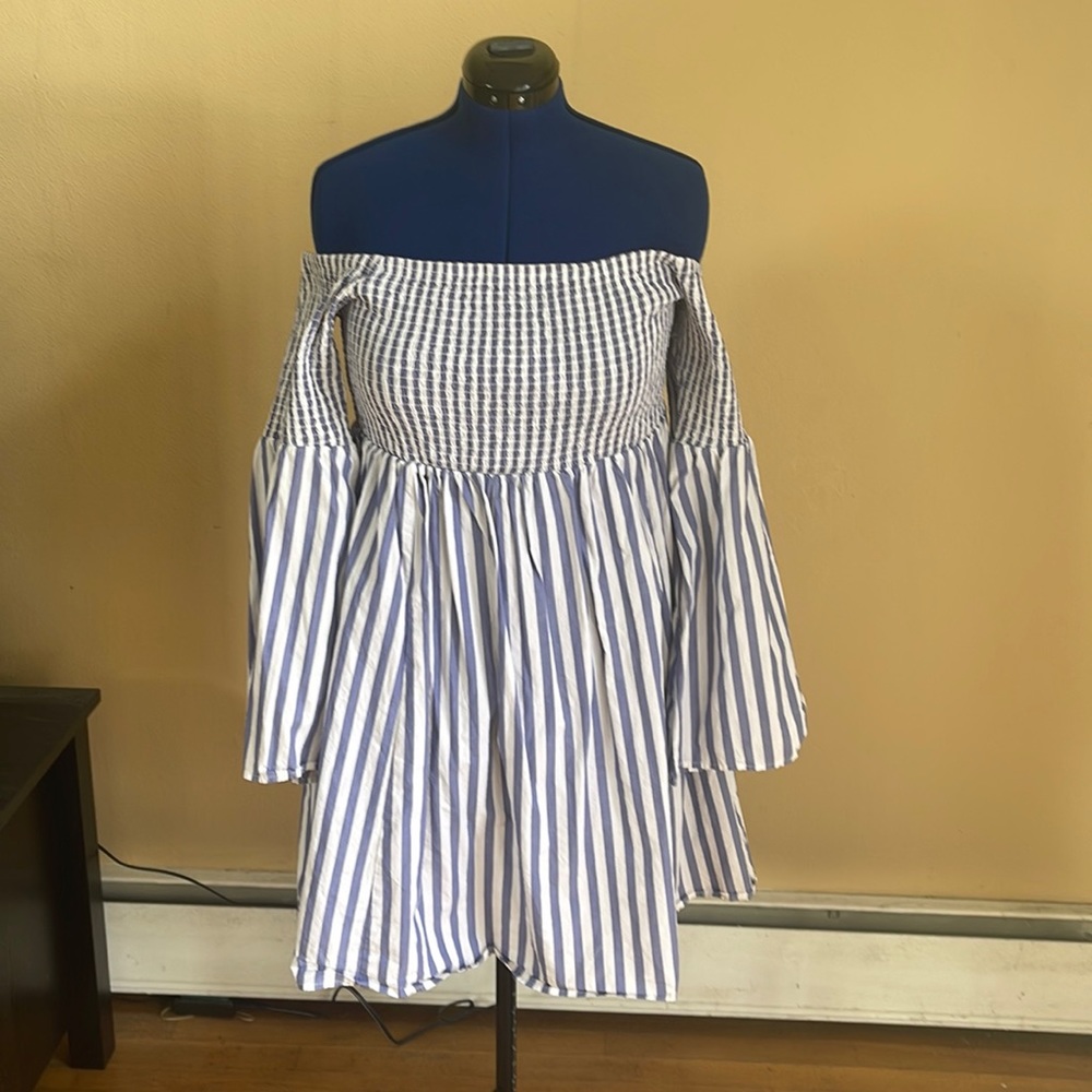 A blue and white strip off shoulder dress from torrid a size 2 (14/16).